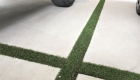 愛知県豊田市の新築エクステリア：人工芝の緑が駐車場のアクセントに
